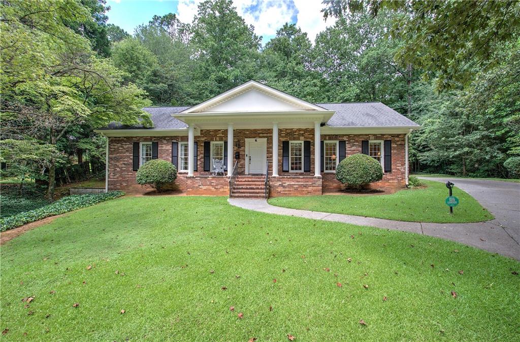 Beautiful four sides brick ranch, well-built brick home lovingly maintained, great location, beautiful large private lot, full unfinished basement, screened porch with a private back yard, wooded area beyond the rear yard, foyer, living room, dining room, kitchen, office/den off the breakfast area, three bedrooms and two baths, finished stairs in the foyer to an expandable attic, boat door in the full unfinished basement.