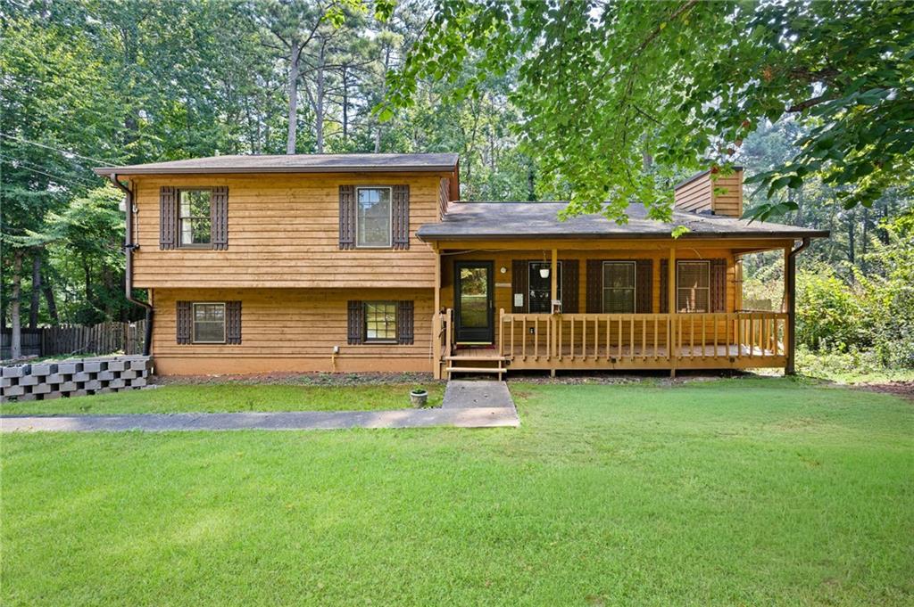 Welcome home to your renovated ranch home on a corner half acre lot. 3-bedroom, 2-bath open floor plan with a 2-car side-entry garage. The kitchen flows into the dining area which overlooks the large family room with gas fireplace. Upgrades throughout! New dishwasher, new flooring, updated electrical panel, fresh paint, modern baseboards, and updated rocker-style switches and USB outlets in select rooms. Hall bathroom has been fully renovated with enlarged shower. The kitchen has been partially updated to include a kitchen island with butcher block countertop. Kitchen boasts two large pantry cabinets, gas stove, and granite countertops. Newly added fireproof door added between the home and garage for extra safety and security. Covered back deck overlooks your private fenced backyard. Gorgeous landscaping provides great entertainment spaces. Security lighting on timers (controllable from inside the home) provides peace of mind. The crawl space features a vapor barrier and dehumidifier for added protection and usable storage, easily accessible from the garage. NO HOA! Investor friendly! Quiet, wooded neighborhood close to shopping and schools. This is a great opportunity to own a well-maintained home with key upgrades already in place. Must see!!