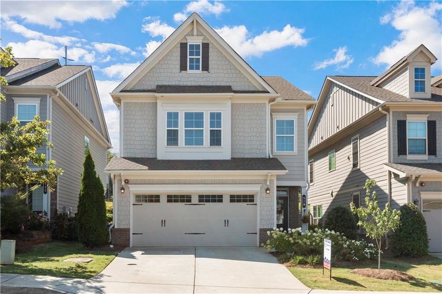 Welcome to Hedges Park, just a short stroll to all the shops, dining & events at Marietta Square! *$10,000 BUYERS INCENTIVE TO USE HOW YOU CHOOSE WITH FULL PRICE OFFER!* This move-in ready beauty exudes the comfort and style you’ve been searching for! When you step inside, you’ll be greeted by warm, espresso-colored wood floors that flow throughout the lower level. The open concept gourmet kitchen is truly the heart of the home, featuring a spacious breakfast area, stainless steel appliances, wall oven with convection microwave, granite countertops, abundant cabinets, walk-in pantry & separate dining area. The family room adds its own appeal with custom shelves for your decor or your own library for avid readers and the gas fireplace makes it easy to cozy up on the couch with a cup of coffee or glass of wine (cheers!) and just in time for fall. The wall of windows overlooks the private fenced back yard that was recently landscaped & offers plenty of space for entertaining guests, grilling, play time or running room for your fury friends! Upstairs you will find 3 carpeted bedrooms & 2 full tiled bathrooms and a separate laundry room. The owners suite offers abundance of space, style & comfort with beautiful tray ceiling, wall of windows where natural sunlight flows and the bathroom features double vanities, soaking tub, walk-in tiled shower and large walk-in closet. HOA maintains the lawns year round. And did I mention this is near the lively Marietta Square? Buckle up buttercup, because this lovely home is where charm, comfort, and convenience come together, all within walking distance on the trail from the home straight to shopping, dining, museums, theaters, farmers markets, art shows, parks, trails, outdoor concerts, and more! Welcome Home!