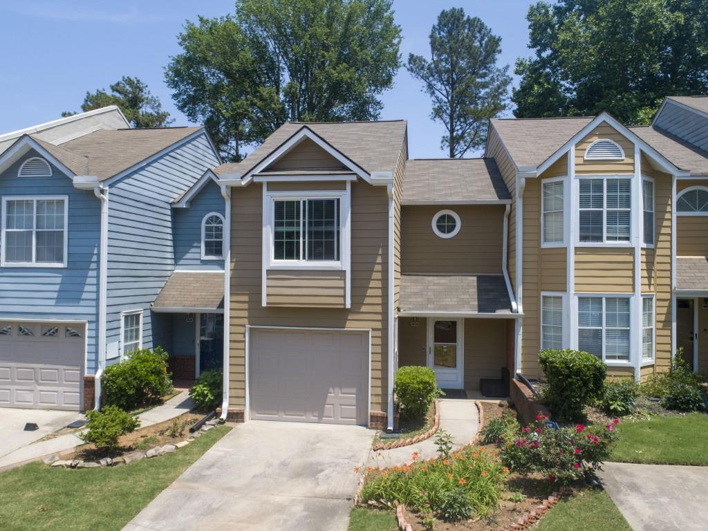 Location, Location, Location!!!Welcome to this charming townhome in Overlook Green! The beautiful kitchen with white cabinets and SS appliances is a perfect place to create your gourmet meals. Gleaming hardwood floors throughout. Spacious great room with cozy fireplace and built-in bookshelves to display your favorite books and decorative items. Upstairs, two separate bedrooms with their own private fully renovated luxurious bathrooms. Private fenced yard, perfect to entertain your family and friends. The community amenities including a pool and picnic area , make it easy to enjoy great outdoors without having to leave the comfort of your own neighborhood. Conveniently located close to shopping, schools and major highways. Only minutes away from Pleasant hill and Hwy 85. Don't miss the opportunity to make this property your new home!!!