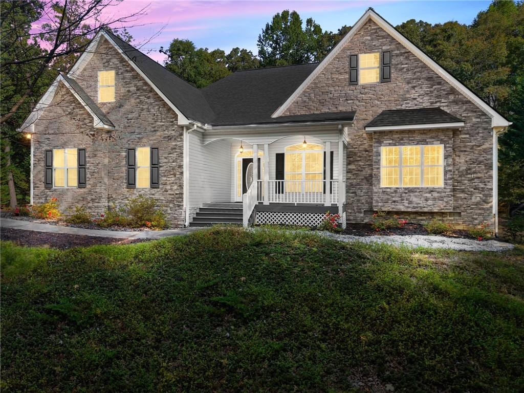 Welcome to this beautiful 4-bedroom, 3-bathroom ranch home complete with its own private saltwater pool and pool house—all at an unbeatable value! Perfectly located just minutes from Lake Lanier, the North Georgia Premium Outlets, and all the outdoor recreation, dining, and shopping Dawsonville has to offer along GA-400.
Step inside to an inviting open floor plan where the spacious family room greets you with a gorgeous view of the sparkling pool. The home features pristine hardwood floors throughout the main living areas, adding warmth and elegance. The kitchen offers generous counter and cabinet space, along with a direct view to the backyard oasis—ideal for both everyday living and entertaining.
The owner's suite boasts tray ceilings and a spa-inspired bath with a large vanity, walk-in shower, and separate soaking tub. Two additional bedrooms on the main level provide plenty of comfort, while the large bonus room/bedroom upstairs—fully heated and cooled—offers flexible space for guests, a media room, or a home office.
Outdoors, enjoy the resort-style backyard with a covered patio, poolside pergola, and a solar-heated saltwater pool for extended seasonal enjoyment. The detached pool house includes a kitchenette and versatile leisure space—perfect for entertaining, relaxing, or working from home. And for added peace of mind, the home comes with an HVAC system that's only 3 years old.
Don't miss this unique opportunity to own your own private retreat in the heart of Dawsonville. Schedule your showing today!