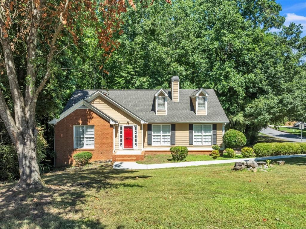 This ranch-style home features a finished basement and a roommate-friendly floor plan, ideal for shared living. The spacious eat-in kitchen is perfect for gatherings, while the living room boasts a cozy fireplace. Recent upgrades include new paint, carpet, fixtures, and plumbing, complemented by a brand-new roof. Situated on a corner lot in a vibrant pool and tennis community, this home offers both comfort and community amenities.