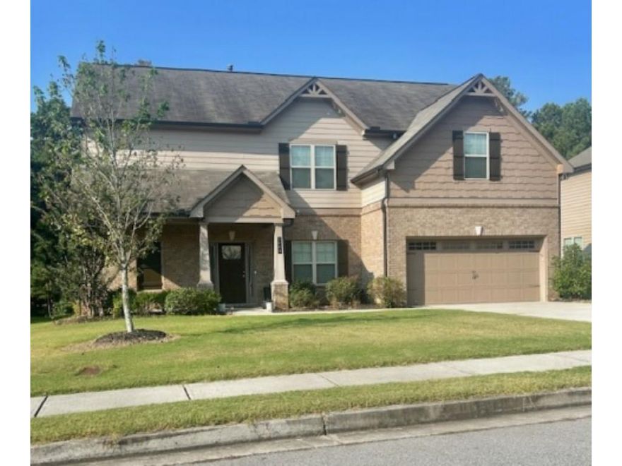 Beautiful 5-bedroom, 3-bath home in the sought-after Overlook at Brookside subdivision, this residence offers a quaint yet open-concept interior perfect for modern living. The main level features a separate dining room, elegant coffered ceilings, and a charming kitchen with granite countertops, a spacious island, and breakfast bar seating. A convenient bedroom and full bath on the main floor make an ideal in-law suite. Upstairs, you’ll find four generously sized bedrooms, including a luxurious master retreat with a large en suite featuring a double vanity, separate tub and shower, and a walk-in closet. Ideally located close to downtown Auburn, this home combines comfort, style, and convenience in one perfect package.