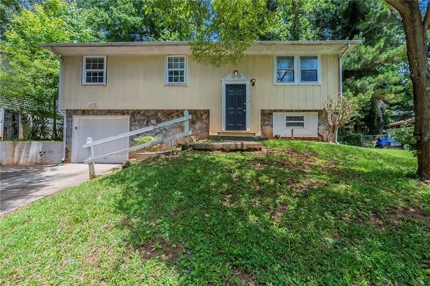 Welcome to this versatile split-level home in the Cherokee Valley community! Offering 4 bedrooms and 3 full baths, this layout provides plenty of flexible space—perfect for families or multi-generational living. Enjoy the option of having a primary suite upstairs or a private suite downstairs, ideal for guests or in-laws. The spacious lot features a deck for outdoor relaxation and a driveway with a built-in garage. Conveniently located near shopping, schools, and major highways, this home is an excellent opportunity to make your own!