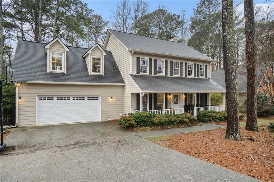 Located in the heart of one of Marietta's most desirable neighborhoods, this 4 bedroom and 2.5 bath home features an inviting, private gunite in-ground pool. Huge deck overlooking partially wooded back yard. Covered front porch for relaxing. Convenient to Marietta Square, schools, and Kennesaw Mountain trails. Pool pump, water heater, deck, and roof replaced in last few years. Oversized master suite includes new flooring throughout, oversized tub, double shower, bidet and updated double vanities. Laundry room upstairs near bedrooms for convenience. Formal living and dining rooms. Kitchen features new appliances and a lovely view to the backyard from dining nook. Family room with brick fireplace and access to deck. Double garage with additional storage. Ready to move in and make it your own!