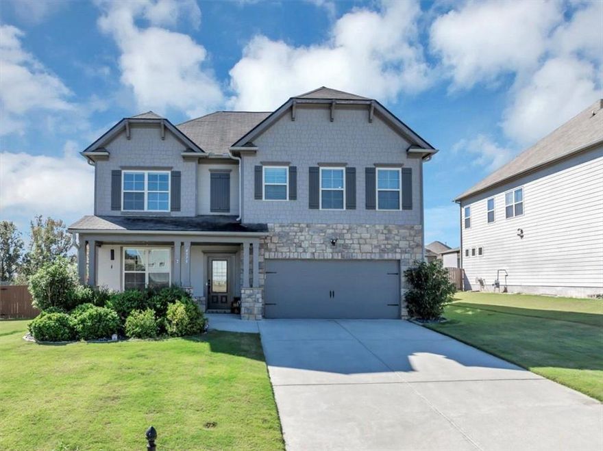 Welcome to this stunning, nearly new single-family home in the highly desirable Bramblett Grove neighborhood, located within the top-rated Forsyth County School District. This thoughtfully designed home features an open-concept floor plan perfect for modern living. The main level offers a flexible space ideal for a home office or formal sitting area, along with a guest bedroom and full bathroom, making it perfect for multi-generational living or visitors. Upstairs, you'll find a generous loft area, a large owner’s suite with a walk-in closet and private bath, plus three additional bedrooms and another full bathroom.
This home is filled with upgrades, including a rear sliding glass door with built-in blinds that opens to a large, fenced backyard, ideal for entertaining or relaxing. Smart home features include smart thermostats, smart light switches in the kitchen, living room, office, and stairs (with dimmable lighting in the kitchen), a smart garage door opener, and a security system complete with a smartlock and a driveway camera/floodlight. Additional highlights include soft-close cabinets and upgraded door hardware throughout the home, a five-zone irrigation system with smart controller, custom trim lighting around the entire home, low-maintenance rock pebble landscaping in the flower beds, and even a robot lawn mower for the backyard.
Residents of Bramblett Grove enjoy fantastic community amenities, including a neighborhood pool, playground, and tennis courts. With its smart features, designer upgrades, and unbeatable location, this home offers a rare opportunity to enjoy both convenience and comfort in one of Cumming’s most sought-after communities.