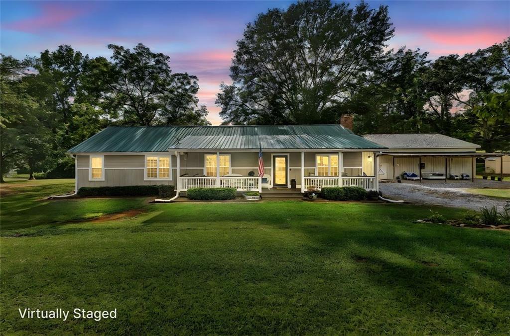 Welcome to 340 Tom Bell Rd — a slice of country paradise on 12 acres in peaceful Milner, GA. This beautifully updated 3-bedroom, 2-bath home blends comfort and function in all the right ways, starting with brand new hardwood floors that flow seamlessly throughout the entire 1,716 square feet of living space. Step into the renovated kitchen, where you’ll find modern finishes, plenty of counter space, and a layout that’s both stylish and practical — perfect for daily meals or weekend gatherings.
Outdoors, the possibilities are wide open. A massive 2,000-square-foot detached building with full power and HVAC offers ideal space for a workshop, storage, studio, or hobby zone — whatever you can dream up. A fully built chicken coop adds a touch of rural charm and the freedom of fresh eggs each morning. And yes — hunting is allowed right on your land, giving outdoor enthusiasts an extra reason to fall in love with this property.
Surrounded by open farmland and rolling acreage, the property offers a tranquil setting where you can spread out and enjoy the views, the space, and the freedom of country living — without giving up essential comforts. Whether you’re looking for a peaceful escape, room to grow, or just a home with character and space, this one checks all the boxes.
Don’t miss your chance to own this one-of-a-kind property. Schedule your showing today and come experience it in person!