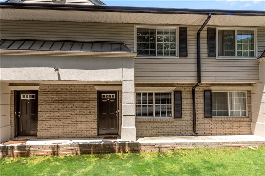BRAZILIAN CHERRY HARDWOODS ON MAIN! GRANITE KITCHEN with Cherry Cabinets, Built-In Microwave, Smooth Cooktop - FRIDGE INCLUDED! Washer/Dryer Included! ALL BRS HAVE LARGE Walk-In CLOSETS. Private Patio/Courtyard. GREAT LOCATION-CLOSE TO SHOPS, RESTAURANTS, MARTA, INTERSTATES. Lease includes HOA, which includes Water, Trash & Swimming Pool! ALL Electric for LOW utility bills.