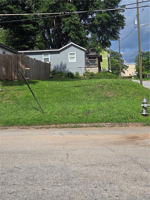Unleash your vision in one of Atlanta’s fastest-growing, opportunity-rich neighborhoods — Pittsburgh. This build-ready lot zoned R5 sits perfectly within a vibrant community known for its dynamic mix of historic charm and forward-thinking redevelopment. Surrounded by new construction and thriving redevelopment. Whether you’re a seasoned developer, savvy investor, or future homeowner, this property presents a rare chance to contribute to the neighborhood’s continued transformation.
Moments from the Pittsburgh Yards 31-acre mixed-use project, two Beltline entrances, and the Beltline Westside Trail at Pittman Park. Minutes from the thriving Lee + White District, Mercedes-Benz Stadium, Summerhill, West End, and all major interstates (I-75/85/20). Easy access to MARTA, Georgia State University, Atlanta Technical College, and Hartsfield-Jackson International Airport.
Whether you're looking to build a modern single-family home, a stylish duplex, or hold as a long-term investment, this lot offers the flexibility and potential to maximize future value.
Seize this opportunity to establish roots or stake your claim in a neighborhood on the rise, where Atlanta’s growth story is unfolding block by block.