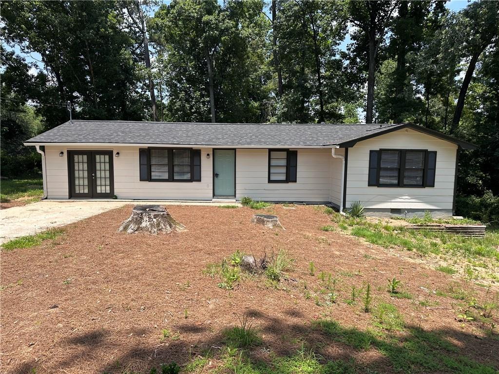 Come one, Come all. Here is the perfect opportunity to find your forever home at below market value. Perfect for first time home buyers looking for sweat equity, Older buyers looking to downsize to one level living or investment opportunity to add to your portfolio. This recently renovated 3/2 Ranch is situated perfectly on just over 1/2 Acre in the back corner of this Non HOA subdivision which backs up to private green space for complete privacy. Enjoy nature just out the back door in your large, private backyard. Garage has been converted into additional Square footage and could be used as a 4th bedroom, Man Cave, additional living room or use as a workshop or storage. New LVP flooring throughout the house. New SS electric cook top range and dishwasher in the open concept kitchen This freshly painted house also boasts a brand new Roof just recently installed and a 2 year old Water Heater. This is a great opportunity to own at a super low price in one of the most up and coming parts of Conyers. Please text Listing Agent with any questions.