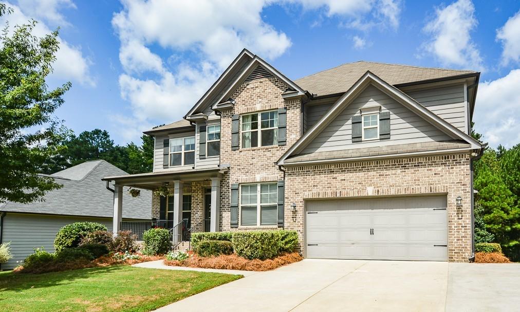 Welcome to this incredible family home located in the Bentwater Golf and Country Club community with access to the best amenities and fabulous North Paulding schools! The home sits on a beautifully landscaped lot with a huge, private, and fenced backyard. Inside, the striking floor plan offers a formal living room/study, banquet-sized formal dining room, enormous chef's kitchen with beautiful granite countertops, oversized island, and breakfast area, main-level guest suite, and more. There is a curved wall of windows in the huge family room overlooking the extended deck and backyard area. Upstairs, double doors lead to the luxurious and massive master suite with a spa bath featuring a garden tub, spacious shower, and double vanities with tons of extra counter space. The huge master closet is super impressive with space galore. Also, there are three additional bedrooms on this level, all with walk-in closets and private bath access. The laundry room is also on this level for added convenience. The finished terrace level makes a perfect in-law or teen suite. It features a spacious bedroom, private bathroom, enormous walk-in closet, second room perfect for a workout area or second bedroom, office area, storage rooms, and a living/media room with a kitchenette area and curved wall of windows overlooking the patio and backyard. This home offers an expansive layout, and is designed for both warmth and space!