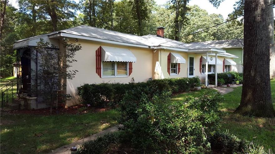 PRICE REDUCED FOR QUICK SELL! This would make a great office after renovations, or tear down and build. Next door to UPS. Only 2 exits from North Point Mall. This property is in a PRIME LOCATION! Zoned as CUP which is either Residential or Commercial. Schedule a private tour today.