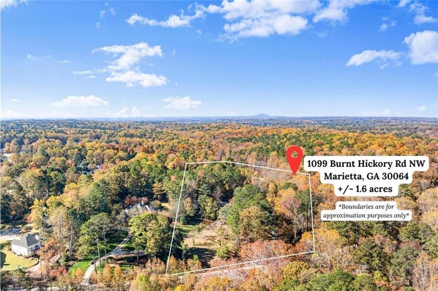 Rare find of a 1.65 +/- acre estate lot in the City of Marietta for your dream home! it borders Noses Creek and Kennesaw Mountain National Battlefield Park.  Access is via a private road that is maintained by the City. This building site is adjacent to Multi-million dollar homes on both sides. There is direct access into the Park as well as the expanded sidewalk network to shopping and dining. The terrain offers a basement building site and room for outdoor spaces such as a pool and garden.  The location offers the best of both worlds - convenience with privacy.