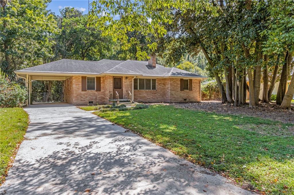 Location, Location, Location! Endless possibilities await with this incredible opportunity in prime North Buckhead. This four-sided brick ranch, featuring 3 bedrooms and 2 full baths, sits on just over a third of an acre and is ready for your vision—whether you remodel or tear down to build your dream home. Perfectly situated in the highly sought-after Sarah Smith Elementary, Sutton Middle, and North Atlanta High School cluster, with several top private schools nearby. Enjoy the convenience of being able to walk to the Blue Heron Nature Preserve and just a short drive to Chastain Park, upscale shopping, dining, and entertainment. No HOA restrictions—just unlimited potential in one of Atlanta’s most desirable neighborhoods!