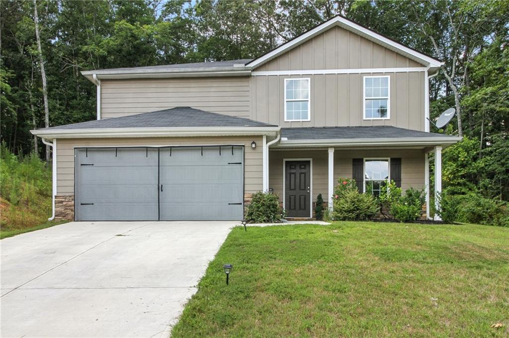 WELCOME HOME to this beautifully designed two-story home, just 2 years old, offering a perfect blend of modern style and spacious comfort. Nestled in a peaceful cul-de-sac, it features five generously sized bedrooms and three full bathrooms. The main level includes a bedroom with a full bath, perfect for visitors, multigenerational living or office space. Step inside to find an open-concept floor plan with luxury vinyl flooring on the main, plush carpeting on the second level, recessed lighting throughout. The spacious kitchen boasts granite countertops, a large island, dining area and stainless-steel appliances. Upstairs, the expansive primary suite offers a private retreat, dual vanities, a walk-in closet. An oversized linen closet in the hallway. Each additional bedroom offers large closets, providing ample storage space. Nicely landscaped front yard with a covered porch. The cul-de-sac location ensures low traffic and is a quiet walkable neighborhood. Other highlights include, a dual HVAC system, like new washer/dryer and refrigerator remaining in the home. A two- car garage, plus four additional parking spaces. No HOA!!! Three Strands Vineyards Winery minutes away. Come see and feel the charm of this lovely home!