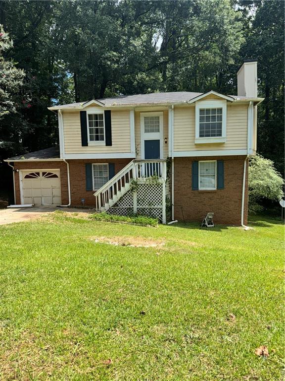 Charming 3BR/2BA split-level home nestled in a quiet cul-de-sac in Lithonia. Features include a master on the main, two spacious living areas, an oversized deck, and a private backyard-perfect for entertaining. Enjoy peace of mind with a newer HVAC system and updated washer/dryer. Conveniently located near I-20 with easy access to downtown Atlanta. Don't miss this move-in-ready gem!