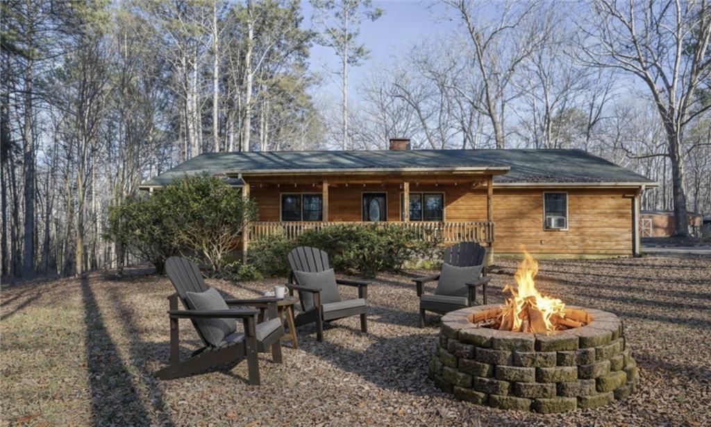 Photo of 6896 Heardsville Road, Cumming, GA 30028 (MLS # 7703811)