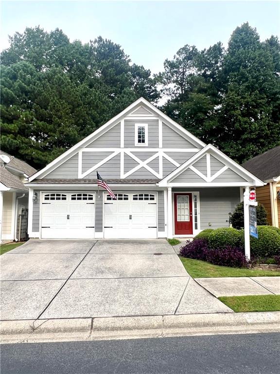 Charming 2-bedroom ranch cottage in the gated Acworth Magnolia Cottage community. This home offers comfort and convenience, located in a peaceful one street neighborhood. The oversized master suite features a vaulted bedroom ceiling and a spacious bath. The 2nd bedroom would be a great office or guest suite. Enjoy your private side patio for morning coffee or quiet evenings. A two-car garage adds storage. This is an ideal retreat for those seeking a simple, secure, and welcoming place to call home. One mile to downtown Acworth, parks, and shopping. While not age-restricted, this community offers the ease of maintenance-free living—HOA dues include lawn care & trash service.