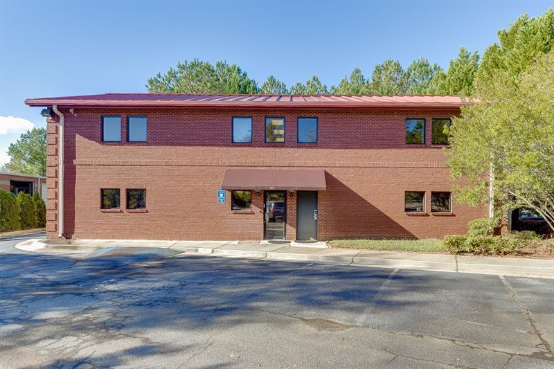 Here is a RARE opportunity to own commercial Real Estate in Downtown Buford! This 5,400 sq ft building is less than a minute from Buford HWY and slightly over a 1 mile radius of 985. Situated near downtown amenities and major highways. Features 12 offices (4 of which are executive), 2 conference rooms, restrooms on both floors, multiple storage rooms, kitchen and Break room! Building is equipped with unique upgrades such as : Upgraded Electrical System to 800 Amp service MANY additional HVAC systems to support server rooms (5 ton units and 2 ton Mitsubishi mini splits) Extensive overhead ladder system for electrical in server rooms 100KW Backup Power Generator (Generac) Natural Gas Fed 2 Separate Server Rooms - 1 with separate exterior entrance with keycode Fenced in rear yard Extensive Interior and Exterior camera system with 24x7 recording Alarm system with several different zones and multiple keypads for tenants Listing Agent must be present for all showings! Alarm is on at all times.
