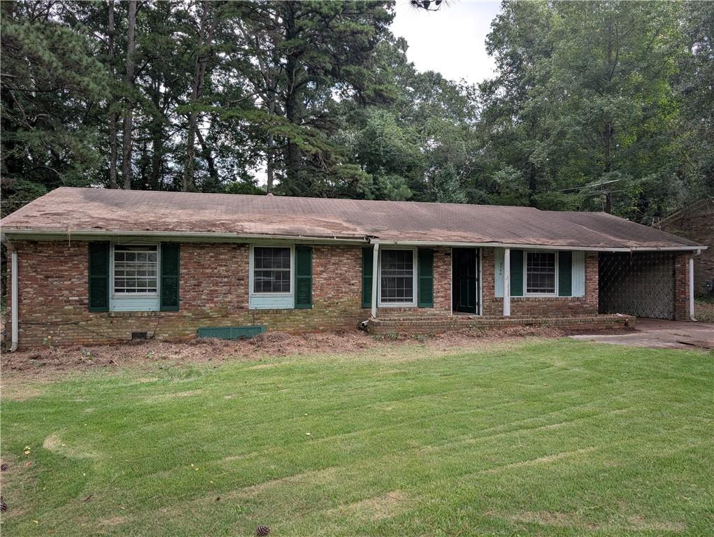 Great Fixer-Upper in Excellent Neighborhood with Good Bones. Quick access to Hartsfield Jackson Airport, Downtown Atlanta and 285. All brick ranch on large level lot. Great street with a history of high comps. Needs full rehab but has solid bones. Super close to the airport, would make a great rental or STR. No HOA.