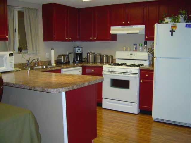 WOW - THIS IS THE PERFECT HOME! NICE EXTRA LIVING SPACE IN NEW ENCLOSED BACK DOUBLE PATIO WITH TILE FLOORS AND EXTRA STORAGE; BEAUTIFUL, REDECORATED NEW COUNTERTOPS, APPLIANCES, REFACED CABINETS, PAINT, CARPET, TILE ON GUEST BATH FLOORS; COMMUNITY UNDER MAJOR RENOVATION TO CHANGE LOOK.