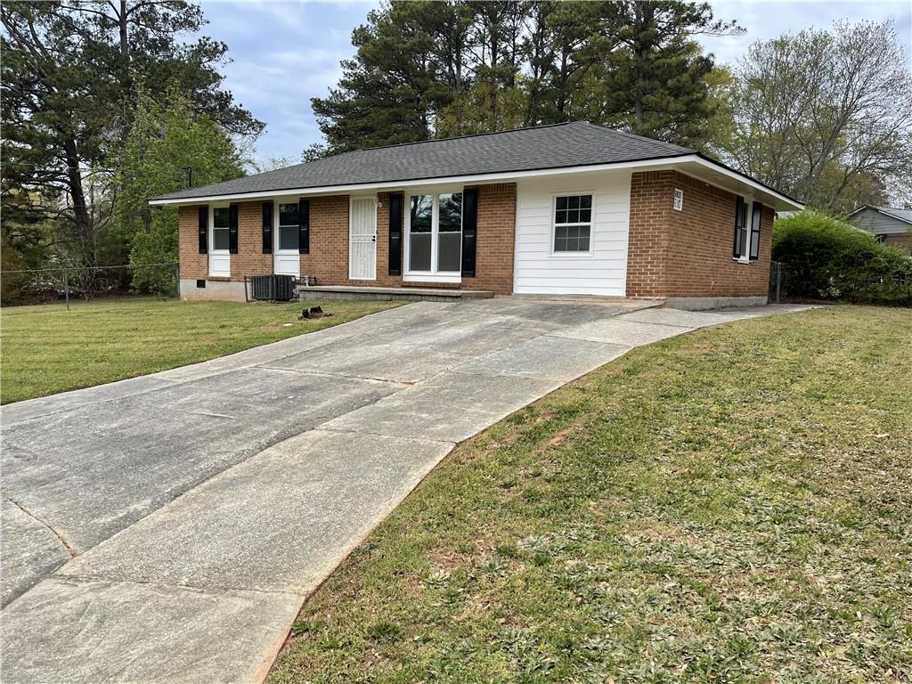 6927 Eunice Drive, Riverdale, Georgia image 1