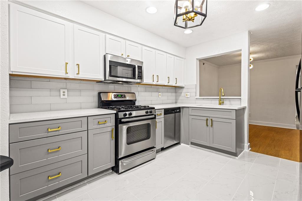 Welcome Home — Where style, comfort, and functionality come together seamlessly. This spacious, STEPLESS home offers effortless living with a fully renovated interior that’s move-in ready. Step inside to discover an open-concept layout filled with natural light, luxury vinyl plank (LVP) flooring throughout and a cozy fireplace that anchors the living space. The updated kitchen is a true showstopper, boasting modern finishes, ample cabinetry, and plenty of room for cooking and entertaining.
Work from home? You’ll love the dedicated office space—quiet, private, and perfect for productivity.
Both bathrooms have been tastefully updated (completing the list of improvements). (And) when it’s time to relax, step out onto the screened porch to enjoy your morning coffee or unwind with an evening breeze. This home is more than move-in ready, but ready for your next move!
When it comes to location, you'll appreciate the many conveniences such as the Chattahoochee River National Recreation Area and Sope Creek Trails - perfect for walking, running, and biking, The Avenue East Cobb and Cumberland Mall offers plenty of retail, dining and entertainment options close to home.
Schedule your tour today to see this gem in the heart of Marietta!