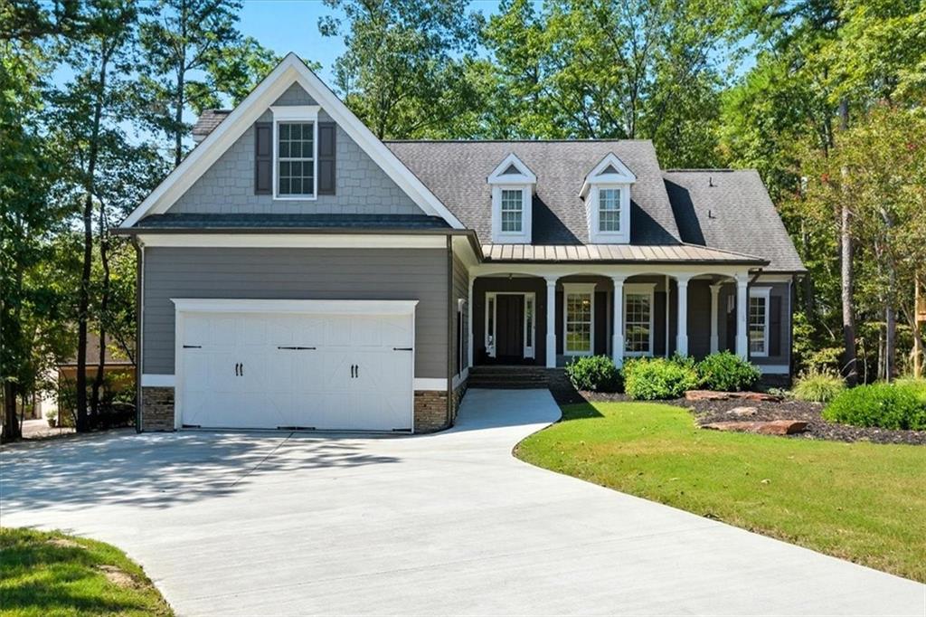 Welcome to 102 Eagle Heart Court, a beautifully upgraded custom-built 4-bedroom, 2.5-bathroom home offering comfort and energy efficiency. This thoughtfully maintained property features a whole-house generator, a buried propane tank, and a tankless water heater—providing energy savings. This home has been meticulously maintained and cared for inside and out. Inside, you'll find a comfortable master suite on the main floor complete with a cozy sitting area and tray ceilings, his-and-hers closets with custom closet systems to utilize space and organization. The primary bathroom offers a luxurious jetted tub and tiled shower. The house has been updated with modern, but classic light fixtures. You will love the ventless gas fireplace and beautiful hearth in the living room with impressive 14-foot ceilings--truly the heart of the home.Â
The kitchen features an updated deep composite sink, touchless faucet, a functional pantry, and upgraded appliances including a GE Cafe dual fuel oven/range with the options of 6 burners or 4 burners with a cast iron griddle. The upstairs bedroom which can also be used as a flex space includes an en-suite half bath—which is also perfect for a home office, gym, media room, craft room, or guest area. You will love the laundry/mudroom on the main floor. The garage has painted epoxy floors. Three workbenches will stay with the home along with a flow wall in the garage for extra convenience, organization, and utility. The basement offers so much--including a built-in safe room! Basement is framed for a living room/media room, laundry room, full kitchen, full bathroom, and 3 additional bedrooms. With four new outlets already installed downstairs, the groundwork is set for your customization. Tech lovers will appreciate the hardwired Ethernet setup in the 4th bedroom/upstairs flex space. The home is constructed with durable 2x6 framing for added stability, increased structural strength, and superior energy efficiency. HVAC unit is newer and has been diligently maintained. Beyond the home's careful upkeep, you can feel secure knowing your new property is covered by a wildlife exclusion guarantee and a metal ridge vent to prevent pest intrusion. All potential entry points have been professionally sealed, ensuring a critter-free environment and saving you from costly future repairs.
Enjoy the outdoors with two spacious decks and an incredible screened-in porch overlooking the private wooded lot. A brand-new driveway (just 8 months old) reinforced with rebar enhances curb appeal, while the side driveway includes an RV receptacle—ideal for travelers or guests. Additional features include new gutters and gutter guards, a radon mitigation system, a termite bond, and added attic insulation for long-term comfort. Completing the home is a stunning custom front door with textured glass, creating a warm and inviting first impression. For additional peace of mind this home is pre-wired for a security system.
Lake Arrowhead features a 540-acre lake surrounded by mountains, pristine wilderness and miles of trails, along with championship golf. With over 20 miles of magnificent shoreline, Lake Arrowhead’s crystal-clear waters boast depths over 80 feet and always remain at a constant level. Being ranked as one of the cleanest lakes in the state, this stream-fed lake is ideal for boating, fishing, swimming, as well as picnicking at the Marina’s Lakeside Park. The 18-hole championship Highlands Golf Course is considered one of the best golf courses in Georgia. Other amenities include the Highlands Grill located in the clubhouse, 2 pools, tennis, pickleball, and volleyball courts, Lake Chickasaw, community docks, and Great Festival Park which has a playground, sidewalks, and a dog park.Â
Blending modern updates with smart features and room to grow, this home is truly a rare find. Don’t miss your chance to make 102 Eagle Heart Court your own private mountain retreat!