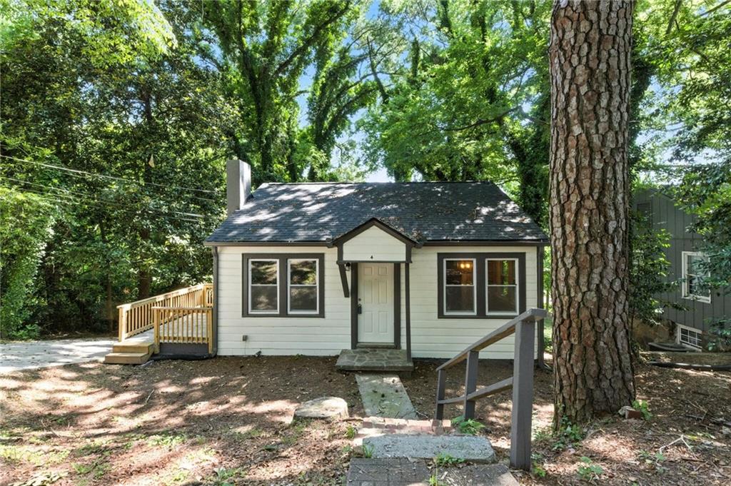 Stunningly renovated 3 bed/1 bath home featuring brand new Luxury Vinyl Plank flooring in the basement, refinished hardwoods, brand new 30-yr Architectural Roof, new HVAC, new interior and exterior paint, new lighting and plumbing fixtures everywhere, new granite countertops in kitchen and bathrooms, and new stainless-steel appliances. Enter into the large living room with fireplace and open views to the kitchen. Kitchen offers new granite, plenty of cabinets and countertops space, stainless steel appliances, and separate dining area. Two bedrooms on the main level and full bath offering tub shower combo with tile surround. In the basement you will find one bedroom/recreation area in the basement with large garage/storage area. Large deck on the side of the house.