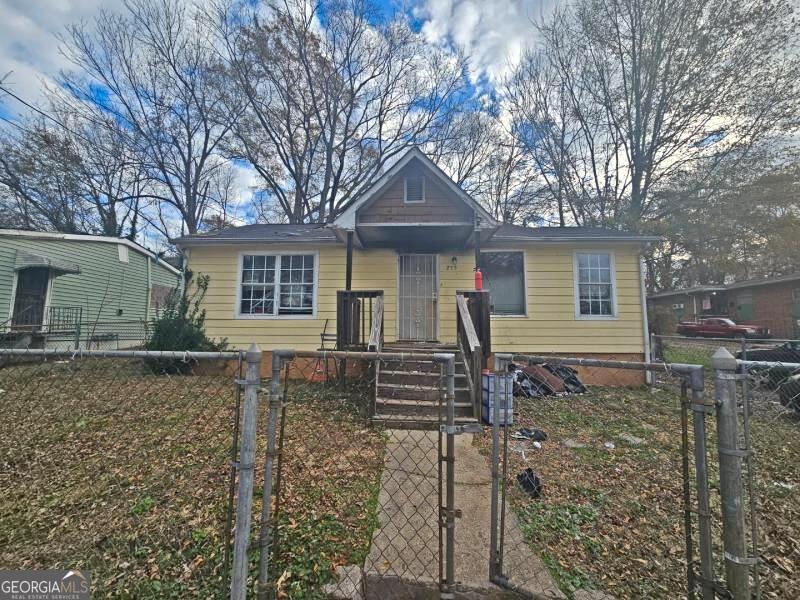 Unlock the potential of this 3-bedroom, 1-bathroom, 1200 sq. ft. home located minutes from Atlanta's top attractions, including Mercedes-Benz Stadium and the Beltline. Situated in a thriving neighborhood, this property offers a rewarding project for investors or renovators. While the interior requires restoration due to fire damage, the exterior is in solid condition, providing a strong foundation for improvements. Vacant and ready for immediate evaluation, this is a unique opportunity to enhance and add value in a prime location.