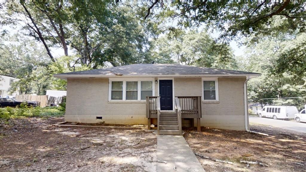Welcome to this beautifully updated 3-bedroom, 1-bath ranch nestled in the heart of Atlanta! This move-in-ready home features stylish LVP flooring and fresh paint throughout, creating a bright and modern feel. The kitchen boasts crisp white cabinets and sleek granite countertops. Step outside to a spacious rear deck and large backyard perfect for entertaining guests or enjoying peaceful evenings outdoors. Located just minutes from the iconic Mercedes-Benz Stadium, a vibrant mix of restaurants and shopping destinations, and the scenic Browns Mill Golf Course, this home offers both comfort and convenience. Don't miss this opportunity to own a gem in one of Atlanta's most connected neighborhoods!
