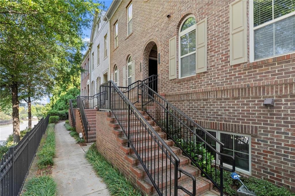 Discover this beautifully maintained 2-story brick condo in the heart of Sandy Springs that lives like a townhome! Step inside to find oak hardwood floors, a fireside living room with custom built-ins, and a private balcony—perfect for morning coffee or evening relaxation.
With three bedrooms and three full bathrooms the options for using the space are endless. Homeowners will enter through the two car side-by-side garge on the ground level where you will find a guest bedroom and full bath. Before acsending the stairs to the main level check out the large storage closet at the base of the stairs.
Upstairs you will find the primary suite, with it's beautiful sunlight streaming in from the northeast facing window, a walk-in closet, and spa-like bath with double vanities, soaking tub, separate shower and private toilet closet. Back out in the hall is the laundry closet, with washer/dryer included, the full hall bath and an additional guest bedroom with large closet.
The chef’s kitchen is a true highlight, featuring granite countertops, stainless steel appliances, a breakfast bar, tons of cabinets including a pantry cabinet and a desk. The open layout flows seamlessly into the dining and living rooms, making entertaining effortless.
Additional features of this Just Listed Property include:
Recently painted bathroom and kitchen cabinets, for a modern luxurious look.
New Carpeting in all three bedrooms and stairs.
New Dishwasher.
Newer HVAC
Storage closet and shelving in garage.
Promenade at Northplace, built in 2006, with it's beautiful and well maintained landscaping offers unmatched value with HOA amenities that cover the pool, natural gas, trash pickup, termite protection, and exterior maintenance indluding the roof! The communities location is hard to match in greater Atlanta. Situated just off GA400 outside the perimeter between Sandy Springs and Dunwoody it is convientient to everywhere! Walking distance to the Mercedez Benz Headquaters and Aria village and a short drive to Perimeter Mall and Sandy Springs City Center where you can enjoy activites from concerts, farmers markets and theater all year long. You will love living at the Promenade with it's ease and convienience all at a great price in the highly sought after Sandy Springs.