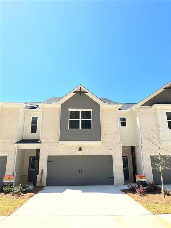 Welcome home to this airy, bright, light and spacious unit nestled in Braxton Square, a peaceful and quiet community in Tucker. When entering this home you are greeted in the foyer by the beautiful luxury vinyl hardwoods; this property features a living room, kitchen, dining area on the main level along with a half bath. The kitchen features white cabinets, quartz countertops and stainless steel appliances. On the second level you will find a large and luxurious master bedroom and bathroom featuring double vanities and a generous master shower. The second level features two additional bedrooms, a full bath, an open loft, and the laundry room. This property also features an electric vehicle charging outlet and a covered back porch. Braxton Square is located in Tucker, Georgia, just 12 miles from Atlanta, 5 miles from Parkview High School, and minutes to shopping, dining, restaurants and city events.