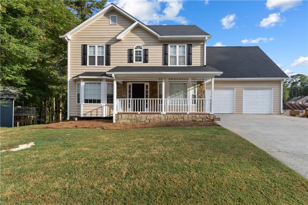 Welcome to the beautiful town of Marietta! This spacious corner lot home offers 4 bedrooms and 3.5 baths with an open floor plan that is perfect for comfortable living and entertaining. The main level features a formal dining room, a private office with French doors, a kitchen with black appliances, and a large deck overlooking the backyard. Upstairs you’ll find a generous master suite along with additional bedrooms that provide plenty of space for the entire family. The full finished basement includes an additional bedroom, full bath, and entertainment area, making it an ideal space for guests, a media room, or recreation. With endless possibilities, this home is perfect for a savvy investor or buyer looking to add their own finishing touches and make it truly their own. Don’t miss the opportunity to turn this house into your dream home!
