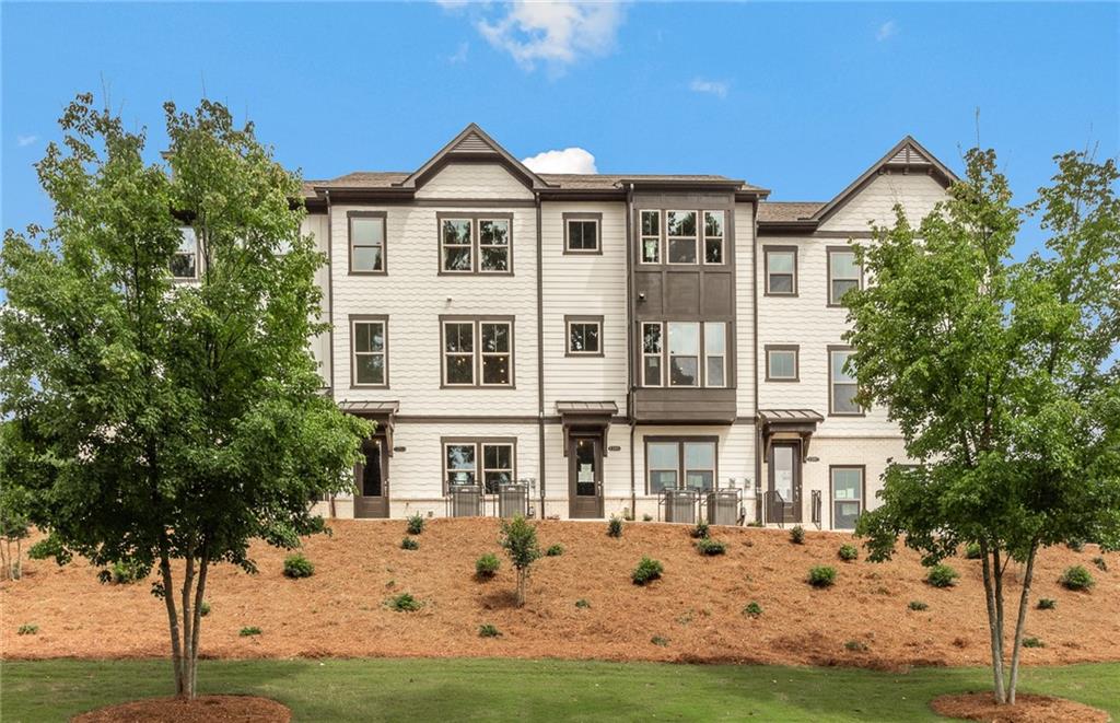 New Construction townhome located in sought after Decatur. The Carver floorplan is perfect for entertaining with the spacious layout. The main floor features an open-concept kitchen, dining room, gathering room and sunroom that overlooks the neighborhood greenery. The ground floor offers a secondary entertainment space with a full bathroom. The Owner’s suite has a sitting room, dual walk-in closets, and spa-like oversized shower w/rain shower head. Other upgrades in the home include hardwoods throughout including the bedrooms, oak treads on stairs, white cabinets, quartz countertops, upgraded lighting package and kitchen-aid SS appliances. Resort-like amenities include pool, fitness center, clubhouse, access to walking trails and more! Prime in town location w/easy access to I-85, 75, & 285. Just 3 miles from Emory University, Emory Hospital, the CDC, CHOA Hospital, and the Atlanta VA Medical Center, you will be right in the heart of it all. Plus, you are just minutes from Toco Hills, where shopping, dining and entertainment options abound. *Photos shown are from the model home. Estimated move-in Aug./Sept. 2025. Pricing currently reflects builder incentive! *Contact our online specialist at 678-839-9583 to schedule an appointment with our sales consultant. For a faster response, please text the number. Ask about our special interest rate promotion.