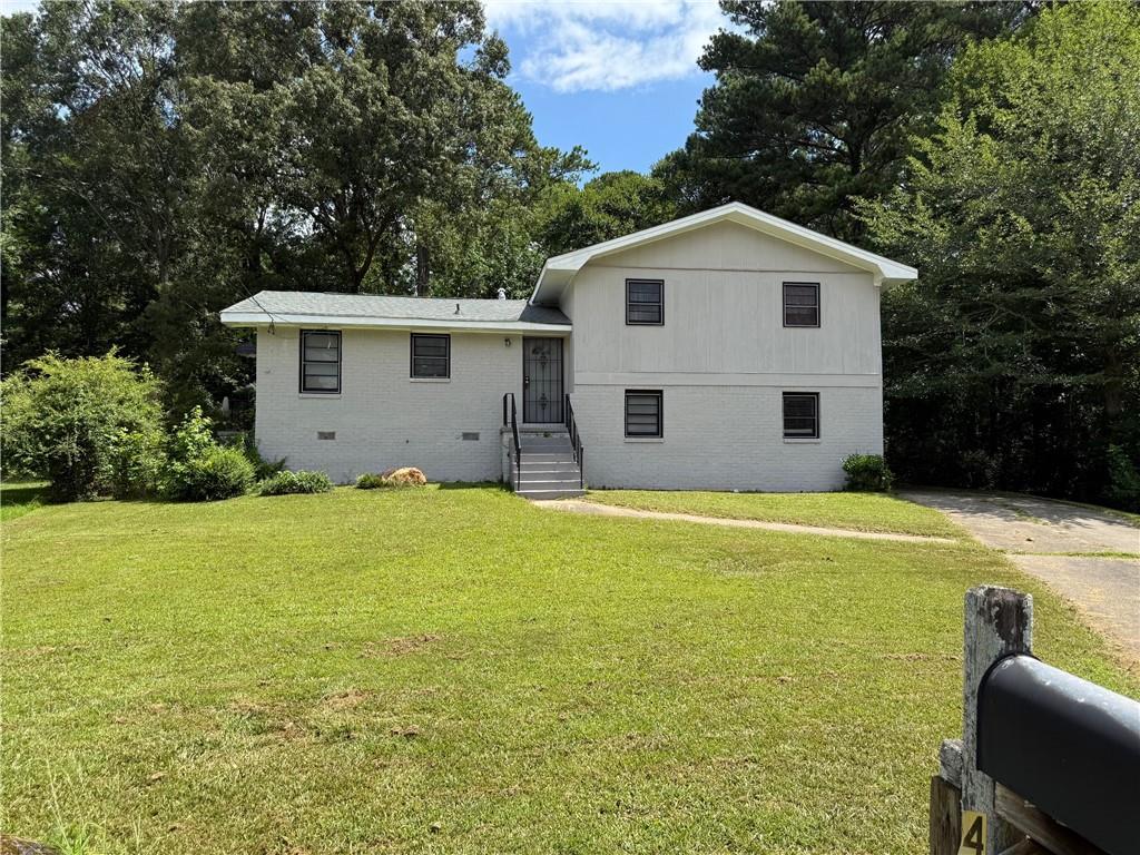 Priced to Sell! This 3-bedroom, 2-bath split level brick home is bursting with potential and ready for the right buyer to bring it to life. Whether you're searching for your next renovation project or a budget-friendly canvas to create your dream home, this is the one. While it needs some TLC, the possibilities are endless—transform it into a charming personal residence or a profitable investment property. Located in a desirable area, this opportunity won’t last long. Showings permitted during due diligence only. Don’t miss out—submit your offer today!
