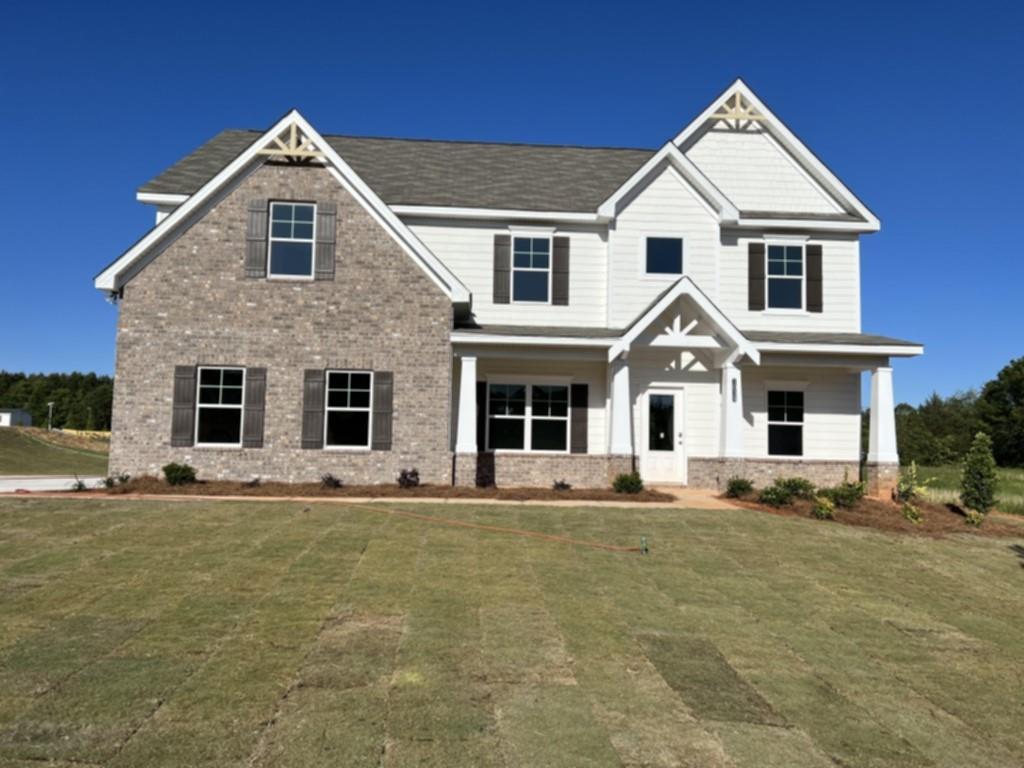 Katherine plan built by Direct Residential Communities. This grand home features a beautiful two-story foyer - bringing in lots of natural light. Alongside the stunning entryway features an intimate formal Living Room and a bright formal Dining Room. Just beyond is the large Great Room - which opens up to a Breakfast Area and modern Kitchen featuring large island, granite counter tops and tile backsplash. In addition, the main level also has a bedroom/study and a full bathroom. On the upper level, you will find a room Loft - perfect for additional lounging/entertaining. The Primary Bedroom has a beautiful trey ceiling and attached Bathroom Suite features large walk-in closet, double vanities with granite counter tops, tile shower and separate tub. Spacious secondary Bedrooms round off the upper level. This dream home is located on over 1 acre homesite. Sit back and enjoy the view from your extended covered patio. *Secondary photos are stock photos* Located in a picturesque enclave of only 29 homes, convenient to Hwy 78 and less than 10 minutes from beautiful downtown Monroe. Incentive with Preferred Lender. Quick Move-In