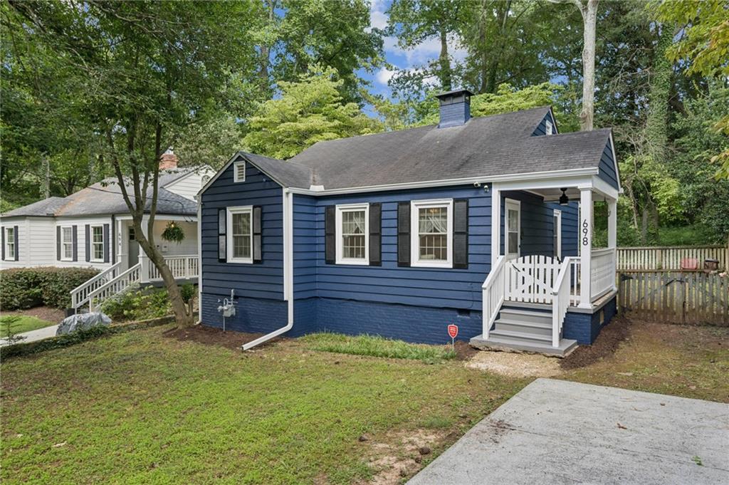 This charming storybook cottage in historic Avondale Estates offers a perfect blend of comfort and tranquility. Located just steps from local shops and restaurants in downtown Avondale, it sits on a peaceful, short street with no through traffic. The spacious lot features a picturesque backyard that feels straight out of a fairytale. The home has been thoughtfully updated with a modern kitchen and bathroom, and includes 2 bedrooms, a laundry closet, dining room, living room, and two inviting porches. Part of the yard is fenced for your privacy and security, while the rest remains a beautiful natural retreat. Conveniently close to Downtown Decatur, Marta, I-285, CDC, Emory, and more, this property offers both charm and accessibility.