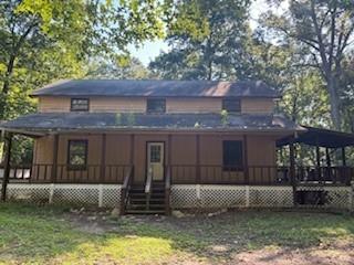 Welcome to 411 Deerhaven Drive in Blairsville, GA! This charming 3-bedroom, 2-bath home is perfectly tucked away on 2.59 private acres in the heart of the North Georgia Mountains. Enjoy a peaceful setting surrounded by nature, complete with a garden area and outbuilding for added storage or hobbies. Located on a quiet street, this property offers the ideal blend of privacy and convenience—just minutes from Lake Nottely Lake Blue Ridge, trout streams, and miles of National Forest for endless outdoor recreation. Whether you’re seeking a full-time residence, mountain getaway, or investment opportunity, this property has so much potential. Don’t miss your chance to own a slice of mountain living!