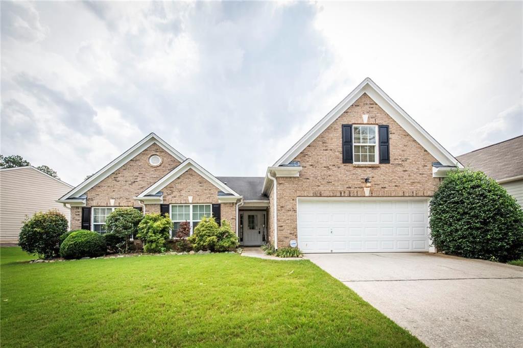 Don't miss this opportunity to live in the desirable Mirror Lake subdivision located in the charming town of Villa Rica. You'll enjoy all the amenities in this golf, lake, swim and tennis community. This 2400 sq ft stepless ranch home has been well cared for and has so much to offer. Step inside and you'll discover recently installed beautiful hardwood floors, a spacious kitchen with large island and breakfast room. You'll enjoy hosting family meals and gatherings in the separate dining room big enough to accommodate a table for 12. Just off the kitchen/breakfast room you'll find an oversized sunroom to relax and enjoy your morning coffee or the perfect place to catch all those football games! The home also features a large master bedroom with separate sitting room, walk in closet and private bath with separate tub and shower. But that's not all! The spacious bonus room above the garage is perfect for an office, playroom, game room, exercise room or whatever your imagination can conjure up! This beautiful Mirror Lake home can be yours at a great price!