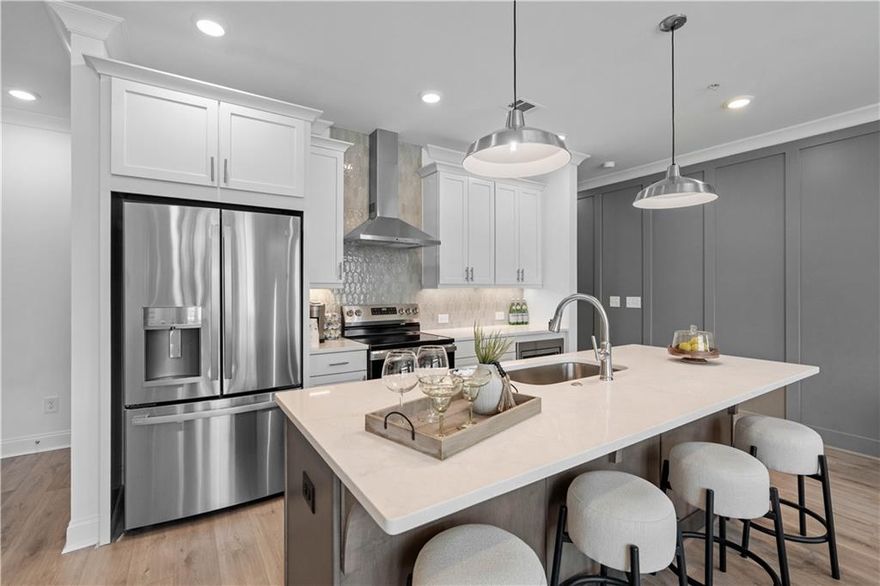 Celebrate the Season of Savings with $10,000 Toward Closing Costs — Discover the Oleander Plan built by The Providence Group. Move-In Ready!

Welcome to the Oleander Plan, a beautifully designed three-story townhome offering 3 spacious bedrooms, 3.5 bathrooms, and 1,703 square feet of thoughtfully crafted living space.

This luxury homesite showcases The Providence Group’s Cool Stone Design Collection, featuring elegant light gray cabinetry, stunning Calacatta Ultra quartz countertops, and durable Dogwood hardwood flooring throughout the main living level and hallways.
Terrace Level: Enjoy a private bedroom with an ensuite bath and access to a covered patio—perfect for guests, a home office, or a personal fitness space. This level also includes a GE Profile 2-in-1 washer/dryer, offering added convenience. A one-car garage is located on this level and comes equipped with EV chargers already installed, making it ideal for modern living.

Main Level: The open-concept layout seamlessly connects the family room, dining area, and chef-inspired kitchen, complete with 42” soft-close cabinetry, stainless GE appliances, tile backsplash, and designer lighting. A walk-out porch from the dining room offers a limited feature view of Market Square’s future retail space, adding charm and convenience. Additional pantry space ensures all your storage needs are met.

Upper Level: Retreat to the Primary Suite, featuring a large walk-in closet, double vanities with quartz countertops, and a spa-like walk-in shower. An additional linen closet provides extra storage. A secondary bedroom with its own private bath completes the top floor.

Market Square at Sawnee Village isn’t just a place to live—it’s a lifestyle. Enjoy walkable access to the Cumming City Center, with exciting new retail and dining options coming soon right at the community entrance. Experience low-maintenance urban living in the heart of Cumming, GA.[The Oleander]