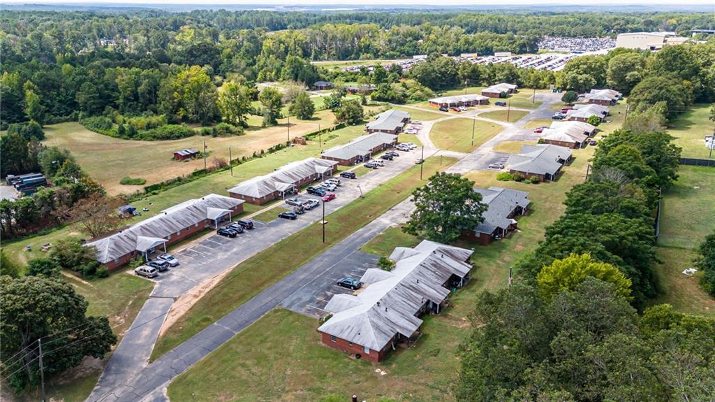 Discover a lucrative investment with this turnkey multifamily property in Jenkinsburg, GA. Spanning 15.3 acres, this site features 53 apartment units and 5 houses, generating a substantial monthly rental income. The land offers significant future development potential, enhancing the property's value and appeal to investors.

Jenkinsburg, a charming town in Butts County, Georgia, combines rich history with vibrant modern amenities. It is part of the Atlanta metropolitan area, offering convenient access via U.S. Highway 23 and Georgia Highway 42. Known for its quaint downtown, picturesque neighborhoods, and thriving business district, Jenkinsburg boasts over 40 enterprises, providing a blend of historic charm and economic vitality. Residents enjoy scenic outdoor spaces like Memorial Park, complete with walking paths, playgrounds, and serene spots for relaxation.

This property not only offers immediate income but also holds long-term development potential, making it a prime investment in one of Georgia's most entrepreneurial towns. Don’t miss out on this exceptional opportunity in Jenkinsburg, where historic charm meets future growth.