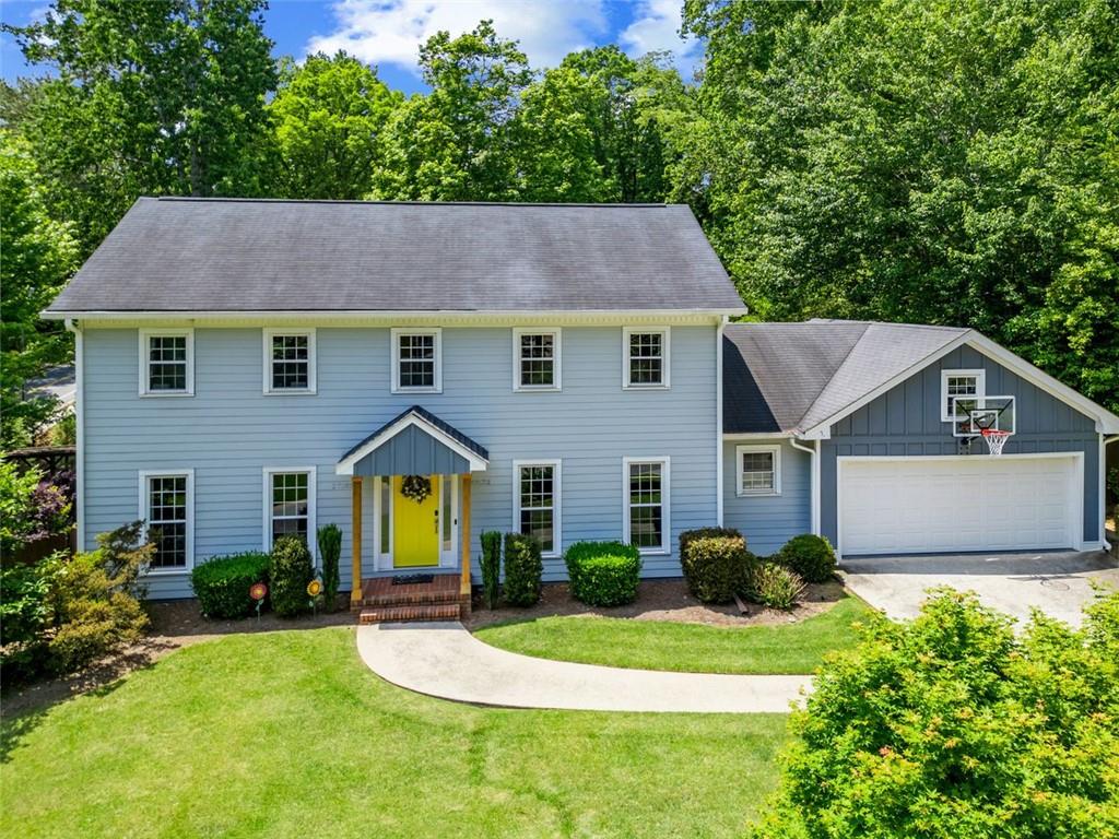 Welcome to this breathtaking two-story Colonial, perfectly nestled in the heart of Brookhaven’s coveted Murphey Candler and Blackburn Park neighborhood, a community renowned for its vibrant lifestyle and natural beauty. Recently reimagined with a fully redesigned hardy plank exterior and a striking new front portico, this 4 BDRM/3.5 BA masterpiece blends timeless elegance with modern sophistication, seton a meticulously landscaped lot along a serene, tree-lined street. Step inside to gleaming hardwood floors that sweep across the main and upper levels, creating a warm and inviting flow. The expansive living room, bathed in natural light, is ideal for cozy nights or lively gatherings, while the adjacent formal dining room sets the stage for unforgettable dinners. The well-appointed kitchen features lustrous solid stone countertops, premium stainless steel appliances, and custom cabinetry. French doors open to a spacious, newly constructed screened-in porch, equipped with heaters and fans for year-round comfort, overlooking a lush, private backyard—a seamless blend of indoor-outdoor living. The inviting family room, anchored by a wood-burning fireplace with a classic stone surround, radiates comfort, with built-in shelving adding style and function. Upstairs, the primary suite offers a luxurious retreat with a spa-inspired ensuite bath. Three additional spacious bedrooms provide versatility for family, guests, or a home office, sharing a stylishly updated full bath with modern finishes. The fully finished lower level is a versatile haven, featuring a recently renovated basement perfect for a home gym, media room, or play area, complemented by a full bath and direct access to the stunning backyard. Outside, the newly landscaped front and back yards are a showstopper, with vibrant raised beds for gardening, a charming play-set for endless fun, and a stone firepit for cozy evenings under the stars. Enclosed by a sturdy privacy fence and framed by mature trees, the backyard is a private oasis for relaxation and entertaining. This home’s prime location offers unparalleled access to the vibrant community life of Murphey Candler Park and Blackburn Park. Just steps away, Murphey Candler Park (135 acres) hosts a variety of events throughout the year and is home to some of the area’s best youth sports programs, featuring baseball, softball, and football. Year-round, families enjoy fishing, hiking the 2-mile lake loop, and playing at the ADA-accessible playground. Meanwhile, Blackburn Park (50 acres) comes alive with the Brookhaven Cherry Blossom Festival in March, alongside the Cherry Blossom 5K, a Peachtree Road Race qualifier. The park’s Nancy Creek Trail connects to Murphey Candler, perfect for year-round walking, jogging, or cycling. A short stroll from the esteemed Marist Private School and Montgomery Elementary School, this Colonial gem marries exceptional craftsmanship with an unbeatable location. With its reimagined hardy plank exterior, expansive screened-in deck, and beautifully curated outdoor spaces, this home is more than a residence—it’s a gateway to an active, community-driven lifestyle. Refined, timeless, and move-in ready. Welcome to your forever sanctuary!