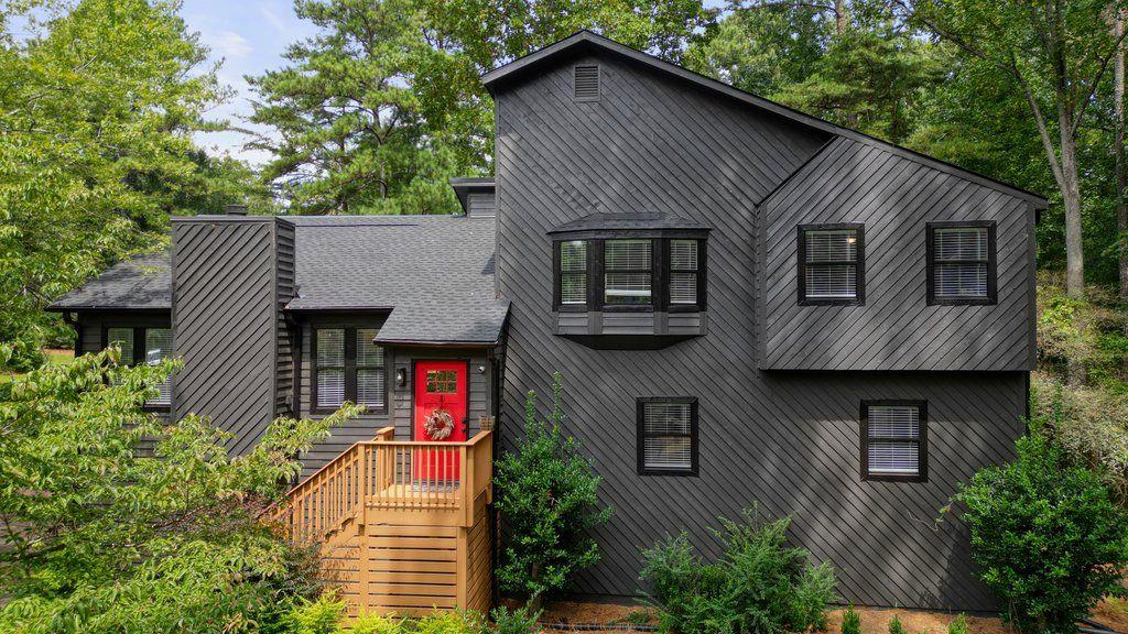 Welcome to this beautifully renovated 5BR/3BA contemporary home in the sought-after Lassiter High School District!
This stunning updated home has been renovated inside and out. Step into the front entryway and be welcomed by soaring vaulted ceilings, an abundance of natural light, and an open-concept living space that creates a seamless flow throughout.
Enjoy fresh interior and exterior paint, luxury vinyl plank flooring in the main living areas, primary suite, and downstairs bedroom, with plush carpeting in the secondary bedrooms. The open-concept living area features a stunning stone fireplace and a fully renovated kitchen with quartz counter tops, stainless steel appliances, a coffee bar, additional storage, and a drink fridge for added convenience.
The bright and airy dining area opens to sliding glass doors leading to a newly stained deck—perfect for entertaining or enjoying a peaceful evening outdoors. Upstairs, you’ll find a fully renovated guest bathroom, two spacious guest bedrooms, and a large primary suite. The primary suite includes a luxurious en suite bathroom with a large walk-in shower, custom wood wall treatment, double vanities, and a walk-in closet with custom built-ins. On the lower level, there’s a second family room, two additional bedrooms, and a beautifully updated Jack and Jill bathroom—ideal for modern living. The laundry room on this level offers extra storage with built-in shelving and access to additional crawl space storage.
Situated on a large corner lot, this home features a fenced-in backyard with mature trees for tranquility. Additional updates include a brand-new roof (2025), new HVAC system (2024), and a new water heater (2024). HOA for this community is an Optional Voluntary Association.