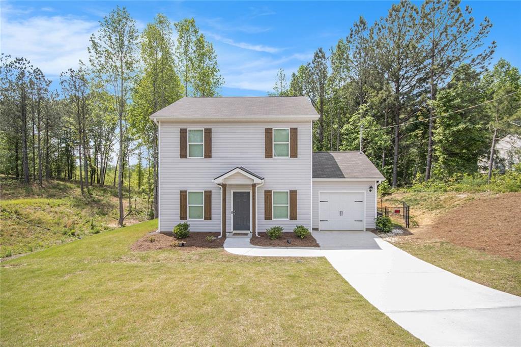 Better than New with additional upgrades included! This 4 bedroom, 2.5 bath home with 1 car garage sits on an established lot with mature trees and a fenced back yard. The kitchen offers beautiful 36-inch, gray cabinets, stainless appliances with granite countertop and also features a dining room, perfect for entertaining family and friends. The main level and the upper-level boast LVP flooring throughout. The primary suite is upstairs and offers a private bathroom and walk-in closet. In addition, three additional bedrooms are located in the upstairs. The home offers maintenance free vinyl siding with custom posts and custom shutters. This home is available for a quick Close. NO HOA!!