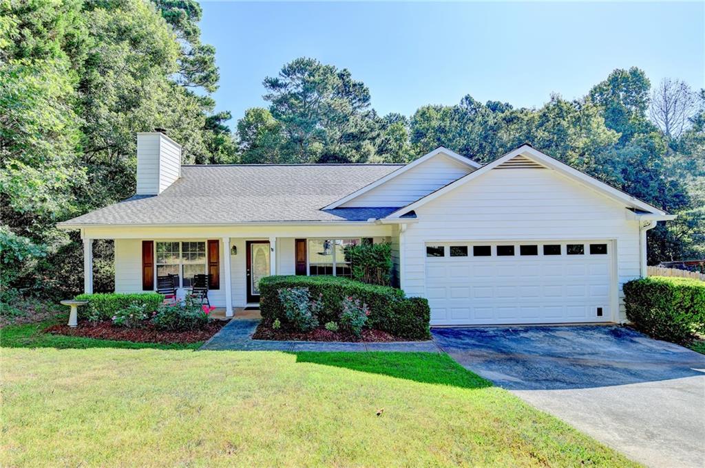 Spacious 3BR/2BA ranch on an over 1 acre lot. NO HOA. Wide open family room with cozy wood burning fireplace. Separate dining room. Kitchen overlooks the family room and includes stainless steel appliances, a breakfast area, pantry, and lots of cabinets for storage. Primary suite on the main level with trey ceiling and private spa bath with garden tub and separate shower. Generous secondary bedrooms. Covered back patio that is great for entertaining or relaxing. Private, fenced-in backyard backs up to a peaceful wooded setting. Just minutes from downtown Winder or Highway 8. Easy access to Bethlehem, Athens, and Highway 316. Shopping, restaurants, and parks nearby.