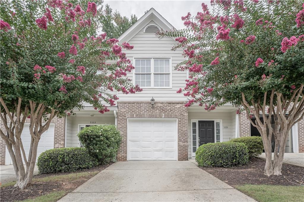 Upgraded & Move-in Ready! Welcome to this beautifully renovated home nestled between Norcross and Lilburn, in a quiet gated community. Featuring 3 bedrooms and 2.5 bathrooms, this home has been thoughtfully updated with fresh paint (inside & out), brand-new appliances, upgraded lighting, new carpet, and modern finishes throughout. The kitchen boasts freshly painted cabinets, stylish new fixtures, and all-new appliances, making it the perfect space for cooking and entertaining. Upstairs, the spacious primary suite offers soaring ceilings, a double vanity, soaking tub, separate shower, and private water closet. The laundry closet is conveniently located in the hallway near all bedrooms. With easy access to I-85, shopping, dining, and entertainment, this home blends comfort, convenience, and modern upgrades—ready for its new owners!