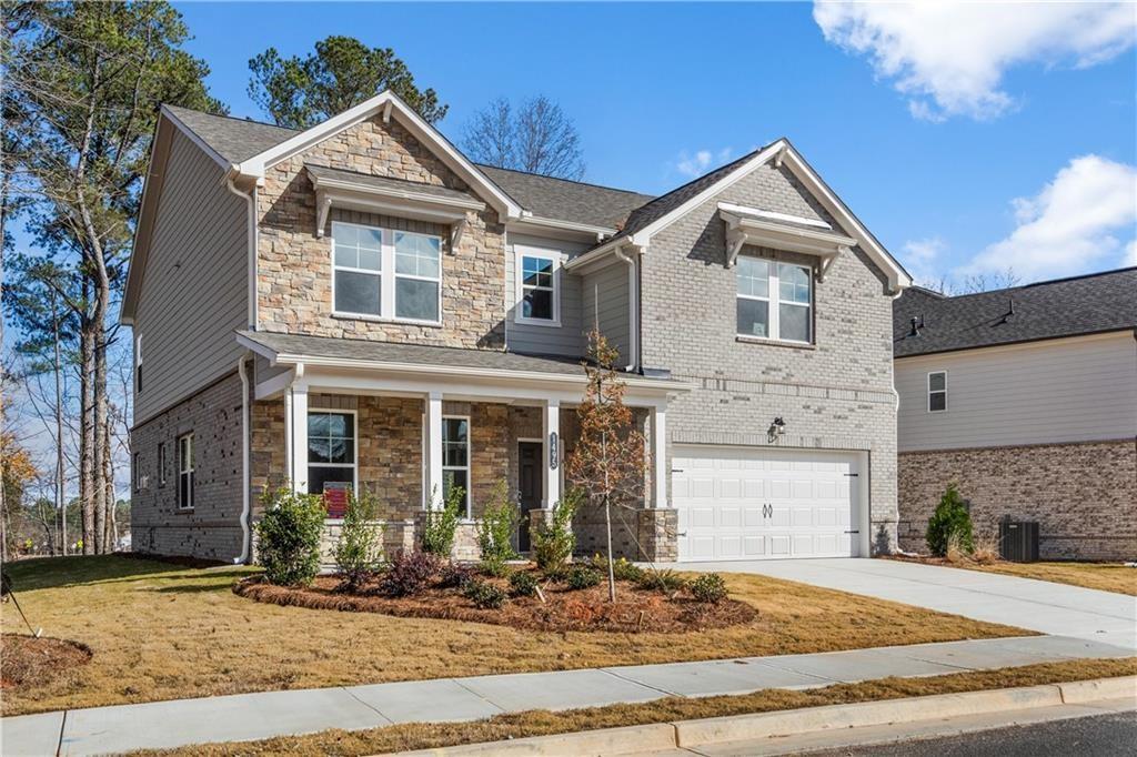 New Construction in Mill Creek High School District! Open and inviting design. Hardwood floors throughout the main floor. A flex space / home office and a formal dining room. Gourmet kitchen with quartz countertops, white cabinetry, and stainless steel appliances views to spacious family room.
Upstairs, a cozy loft, three secondary bedrooms, two full baths, and a convenient laundry room. Large primary suite offers a walk-in closet, soaking tub with a separate shower. Covered back patio. Front porch. Close to I-85, restaurants, shopping centers.***GPS address is "Auburn Glen - Taylor Morrison"***