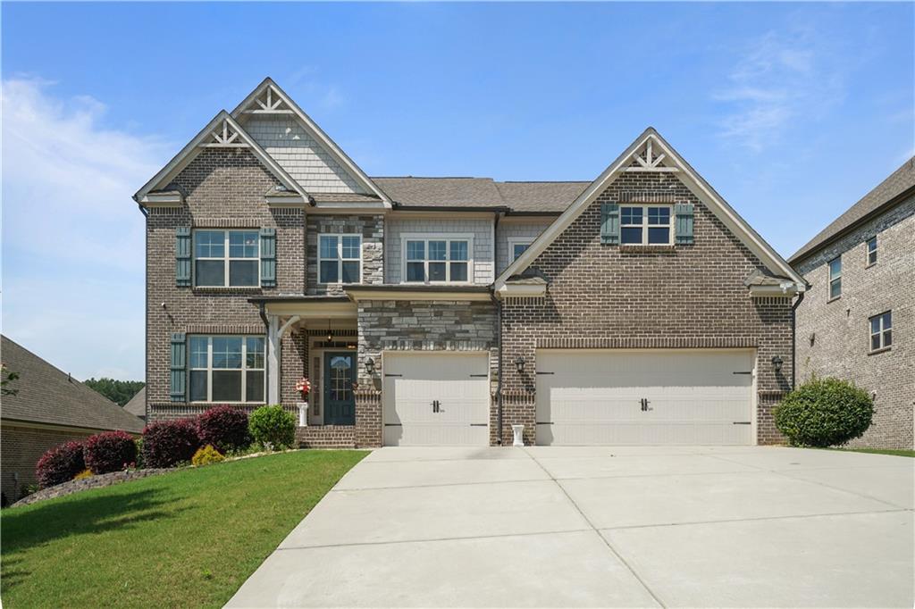 Location!! Location!! Location!! Look no further else. A beautiful & meticulously maintained, NORTH-EAST facing 5 bedroom, 4 bathroom & 3 sided bricks home with full unfinished basement. The family room has a cozy fireplace, coffered ceiling, and abundant natural light. The big open kitchen features huge walk in pantry, stainless steel appliances & granite countertops. The large master bedroom on upstairs with a sitting area and trey ceiling. Storage is never an issue with walk-in closets in each room. A spacious loft area with full of natural light. A guest bedroom with a full bathroom on the main level ensures comfort and privacy for visitors or older people. Step outside to a full covered deck, ideal for relaxing or entertaining. Huge leveled backyard. Big drive way for extra car parking space with 3 car garage entry. Enjoy the amenities of the swim/tennis/playground community. This home is just minutes away from Interstate Highway I-85. Convenient location for shopping at – Buford Mall of Georgia, Costco, Sam's Club, Wal-Mart, Best Buy, At-Home, Publix, Kroger, Restaurants & Café, Furniture Stores, Auto Dealers.
Don't miss it.... Submit your best offer.