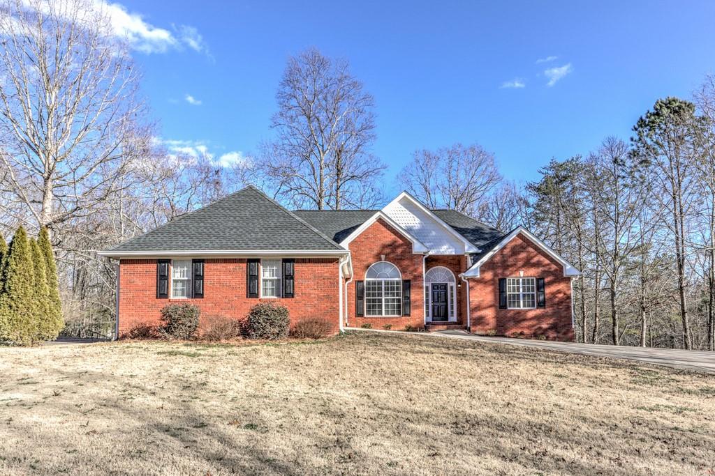 BRICK RANCH home with finished basement and private back yard. The entry invites you into a light and bright living room with high ceilings and wood floors. This home is ideal for those who want everything on one level. Cozy up next to the fireplace, enjoy grilling on the new deck. Owner's Suite with trey ceiling, walk in closet, ensuite bath with large shower and tub. The freshly painted basement has exterior entry has plenty of room for play or work with a full bath and flexible space, potential 4th bedroom and storage. Concrete pad next to the garage perfect for a basketball hoop. Mature landscaping. No HOA.